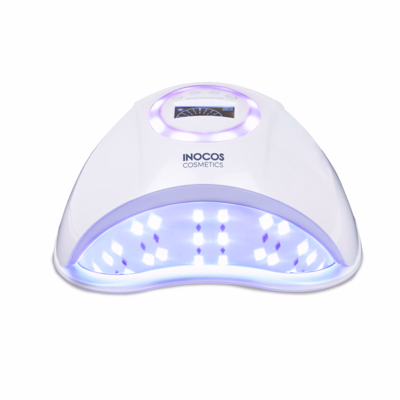 Lâmpada Led-UV 90W tem base de metal amovível, ecrã digital e temporizador em 5 modos REF. 93.04.001 A Lâmpada LED-UV 90W tem uma base de metal amovível que lhe concede um maior de poder de catalisação. Possui ainda um ecrã digital e temporizador arco-íris 5 modos (15 segundos, 30 segundos, 60 segundos, 99 segundos e modo de baixo calor) e uma ventoinha que regula o calor do equipamento. Detalhes: 5 modos 12 tamanhos 45 LEDS