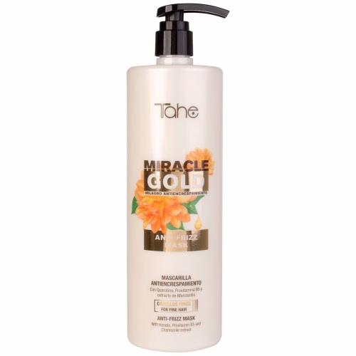 TAHE - MIRACLE GOLD ANTI FRIZZ MÁSCARA CABELOS FINOS 1000ML Milagre anti-frizz Com Queratina, Provitamina B5 e extrato de Camomila. Máscara antiencrespamento, disciplina os cabelos encrespados e finos. Hidratação profunda, volume, brilho intenso e suavidade infinita. Não deixa o cabelo pesado. Aplicar a quantidade necessária no cabelo lavado e húmido. Massajar com a ponta dos dedos e deixar atuar 2 minutos. Passar abundantemente por água. Usar 2 vezes por semana.