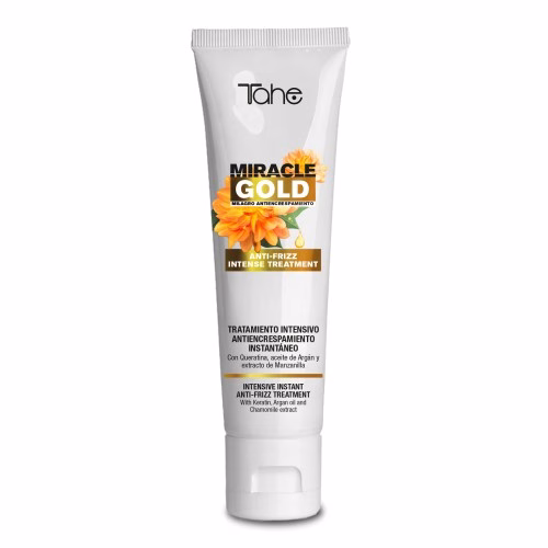 TAHE - MIRACLE GOLD ANTI FRIZZ TRATAMENTO CONCENTRADO 100ML Milagre anti-frizz Com Queratina, óleo de Argão e extrato de Camomila. Fórmula de elevada concentração em princípios ativos e com resultados intensos e instantâneos. Trata em profundidade a secura, o encrespamento e a falta de suavidade e brilho do cabelo. Não deixa o cabelo pesado. No cabelo lavado e húmido, aplicar todo o conteúdo do tubo, dividindo o cabelo em madeixas. Massajar e desembaraçar. Aplicar calor 5 minutos e passar abundantemente por água. PARA TRATAMENTO FLASH: Aplicar, massajar durante 1 minuto e passar abundantemente por água. Frequência de uso: Quando necessitar de uma nutrição profunda.