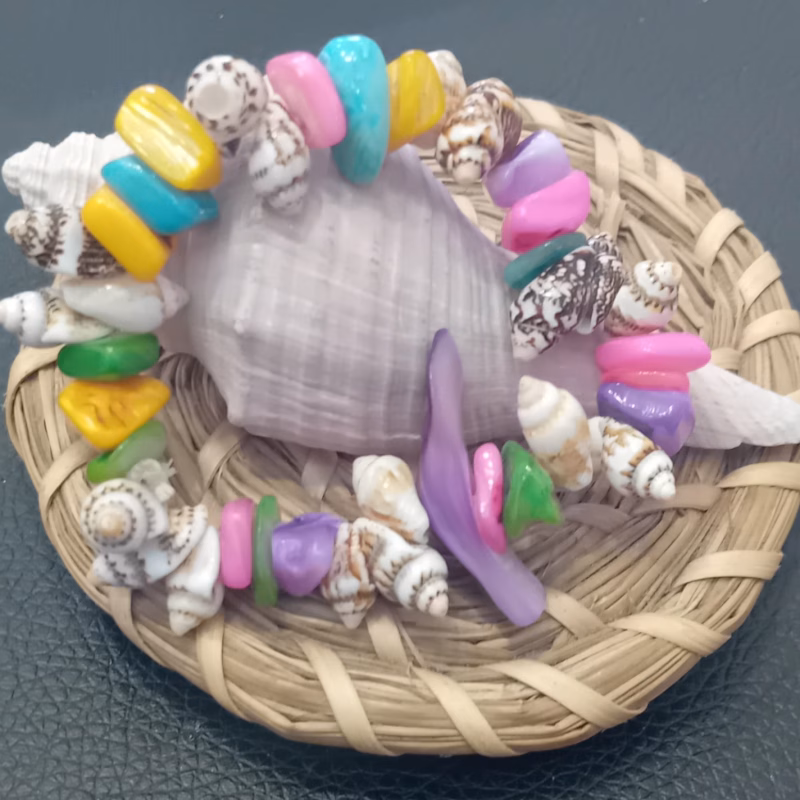BIJUTERIA - Pulseira Boho #03 Artezanal Estilo Design de estilo boémio-chic, ideal para férias na praia Cor: Multicolor Material Conchas de Búzios, Madrepérola e Conchas em formato de cone Limitado ao stock existente