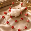 Bijuteria - Conjunto Fio e Pulseira Floral Vermelho Este delicado conjunto de elos dourados apresenta um encantador motivo floral composto por pequenas contas vermelhas em formato de margarida. Pode ser vendido em separado Fio 7€ Pulseira 5€ Limitado ao Stock existente